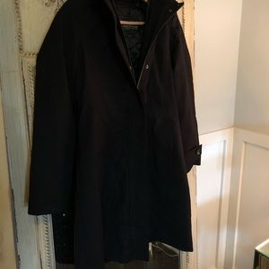 Kristen Blake black coat